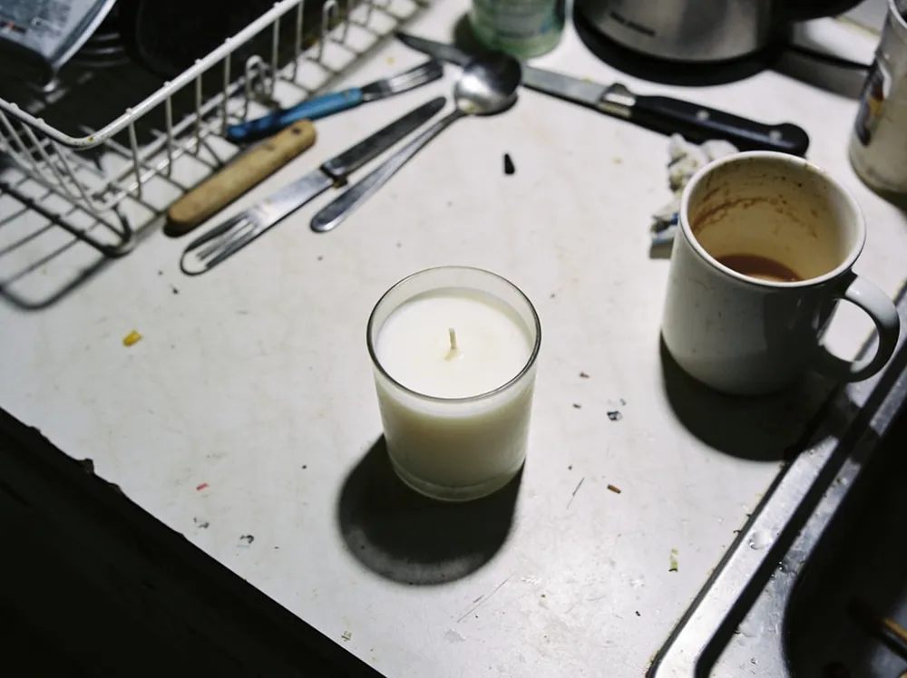 A dull amateur phone snapshot of a candle